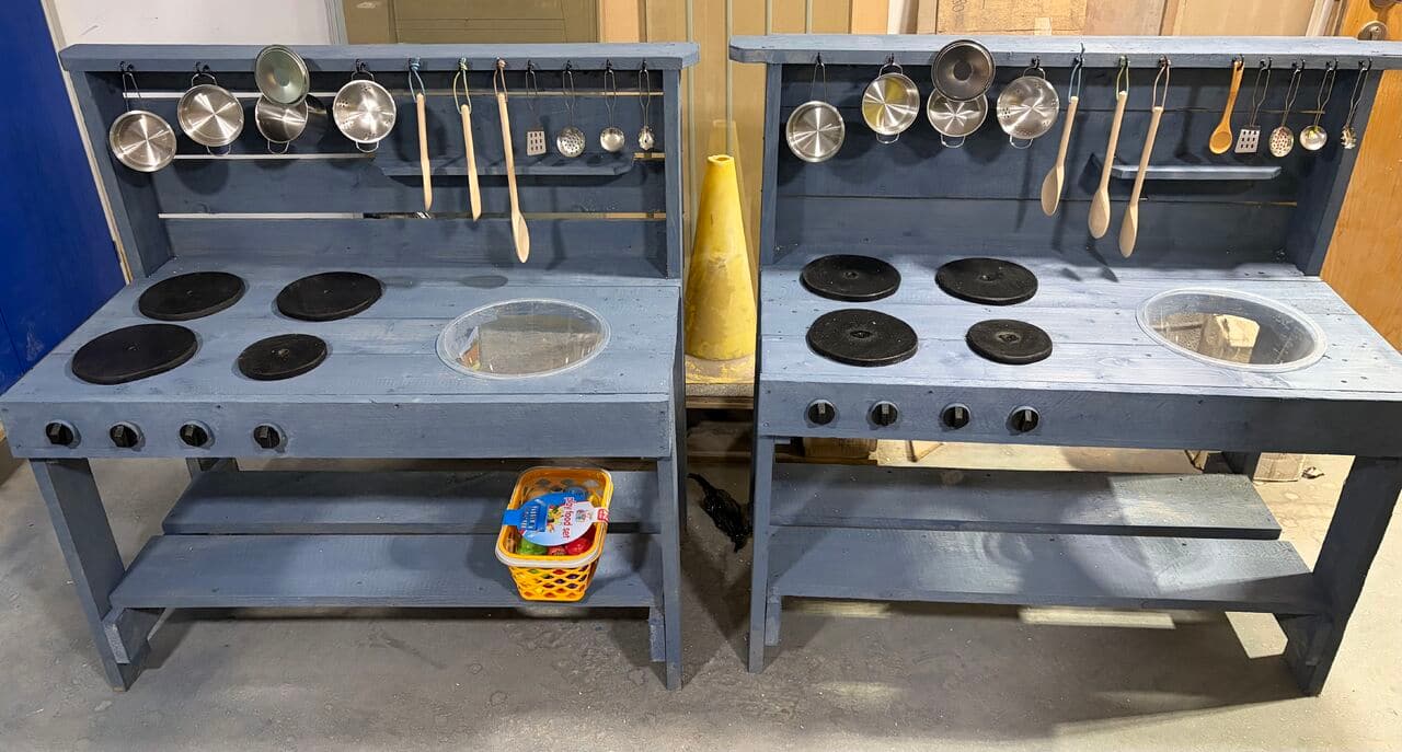 Fire Glass UK crafts community spirit with handmade mud kitchens An employee of Fire Glass UK has created mud kitchens out of scrap wood for a local school