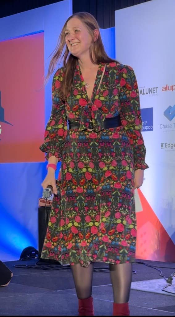 The Glazing Summit, organized by Mark Allen Business, held a charity auction for Kelly's Heroes during its Gala Dinner. Sarah Ball spoke about her Kilimanjaro climb for suicide prevention, thanking attendees and supporters. The event raised over £4,500, underscoring the generosity of the glazing industry in supporting charitable causes.