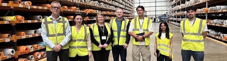 The 2025 Young Professional Industry Experience group visiting Designer Contracts