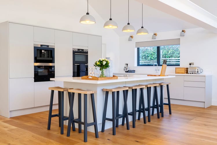 John Fanthorpe founded JFJ Wood Flooring within his joinery business in the early 2000s. His son Tom joined in 2011 and now shares expertise with other joiners, promoting flooring as a lucrative add-on. JFJ offers trade prices, fast quotes, and delivery, aiming to expand their service to more joiners in 2025.