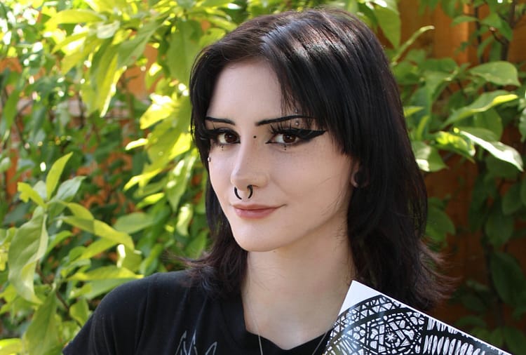 Evie Belle Humphries (pictured) illustrated all the drawings in the Wonderful Windows Creative Colouring book on stained glass